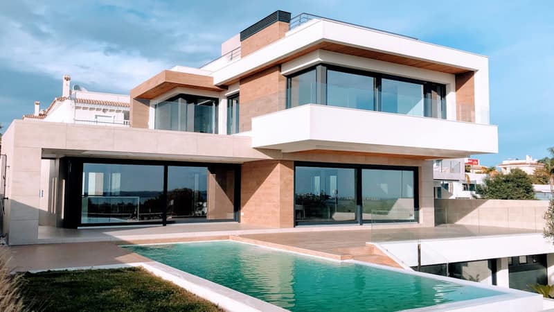 Aerial view showing contrast between modern high-rise buildings and informal settlements in an African city
